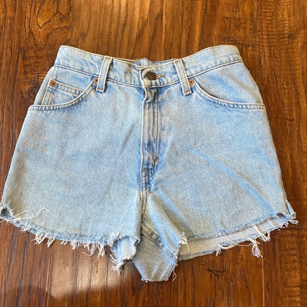Vintage worn light wash Levi’s high waisted shorts